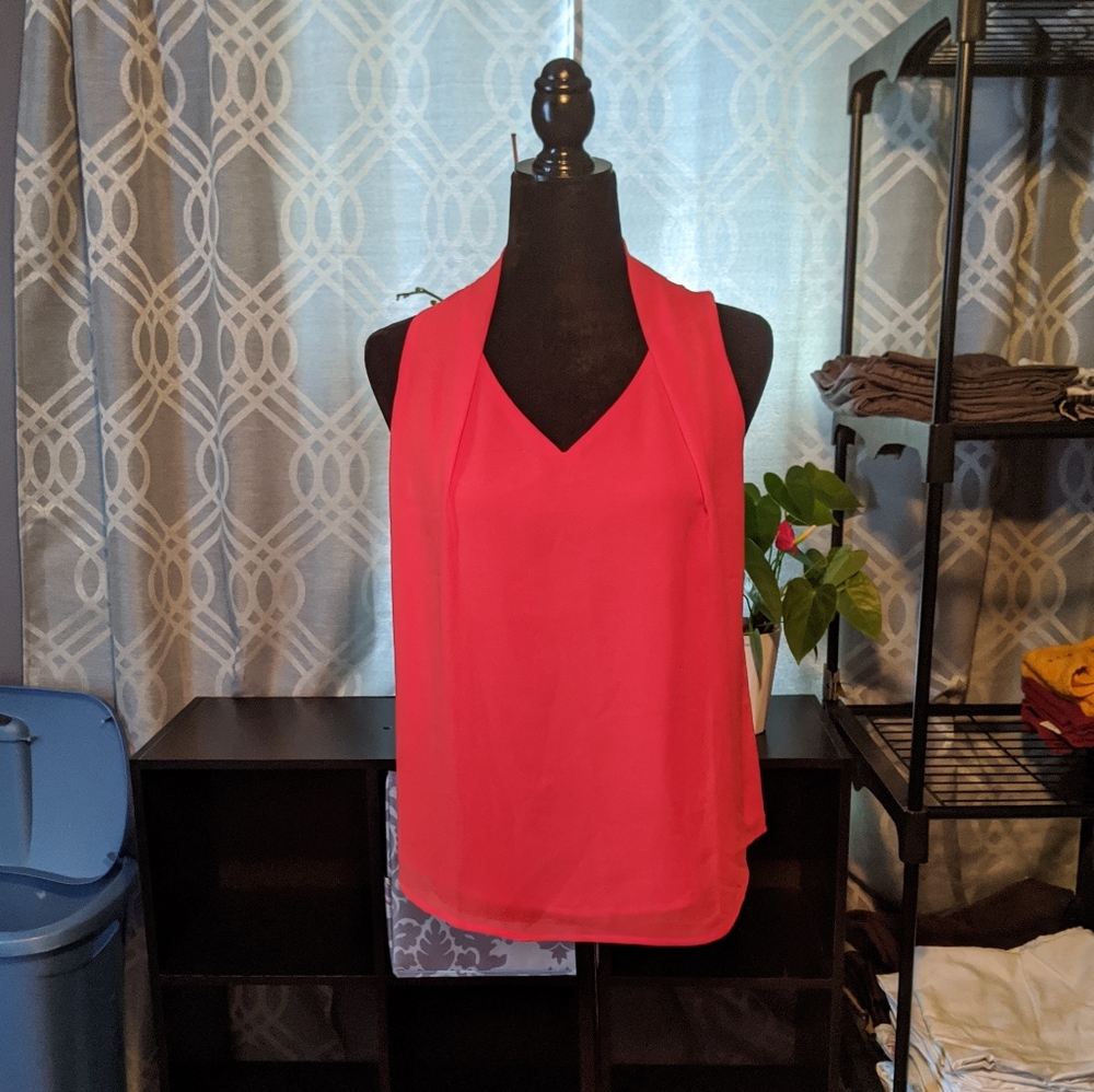 Orange flowy sleeveless top